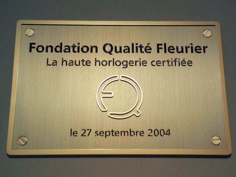 Inauguračná plaketa konzorcia Fondation Qualité Fleurier z roku 2004